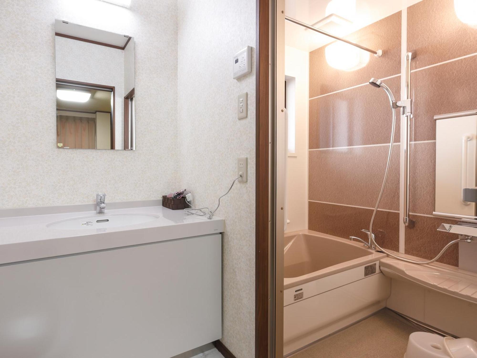 Onsenminshuku Kosakaya Hotell Nachikatsuura Rum bild